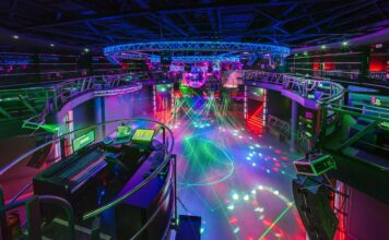 GRODNO, BELARUS - JULY 13, 2013: colorful interior of european stylish night club with bright lights with disco mirror ball