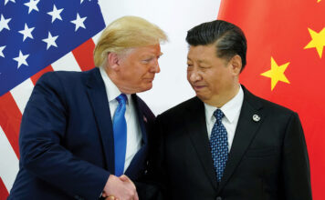 Trump shakes hands with Xi Jinping
