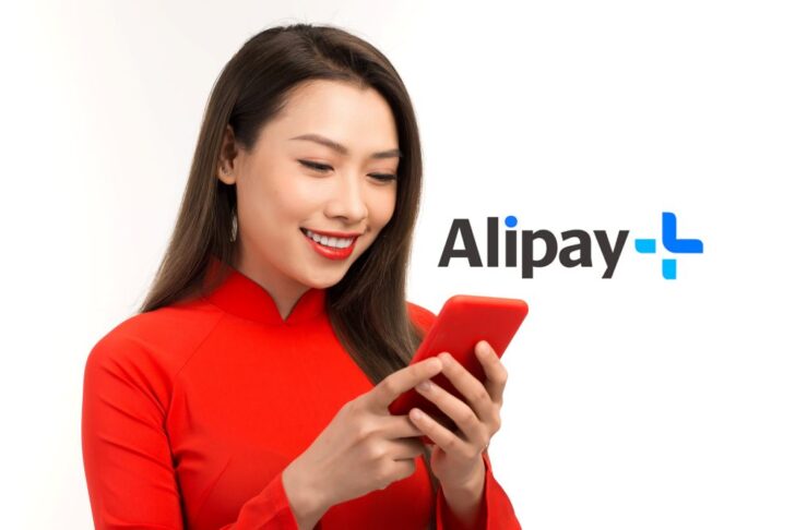cute-asia-girl-ao-dai-smiling-connect-internet-shopping-online-present