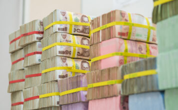 Banks rake in profits กำไรธนาคาร