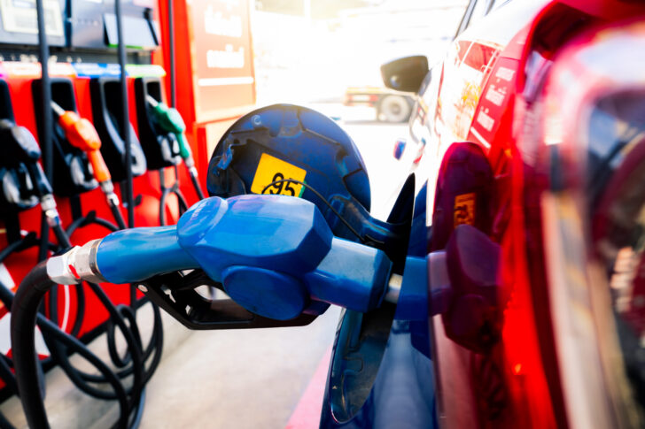 Car fueling at gas station. Refuel fill up with petrol gasoline. เติมน้ำมัน-ปั๊มน้ำมัน