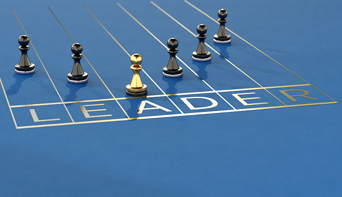 Leadership concept, gold pawn of chess, standing out from the cr