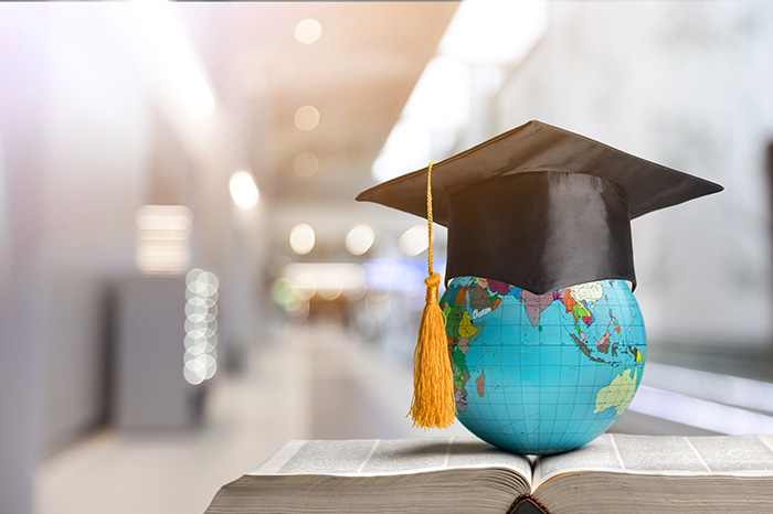 Education to learn study in world. Graduated student studying ab
