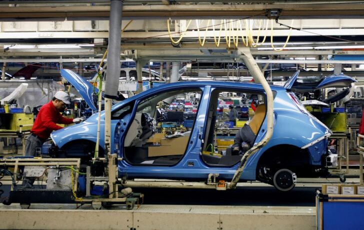 FILE PHOTO: An employee of Nissan Motor works on its Leaf electric car on an assembly line at Oppama plant, in Yokosuka FILE PHOTO: An employee of Nissan Motor works on its Leaf electric car on an assembly line at Oppama plant, in Yokosuka