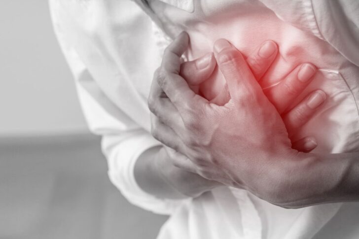digital-composite-image-man-touching-chest-pain