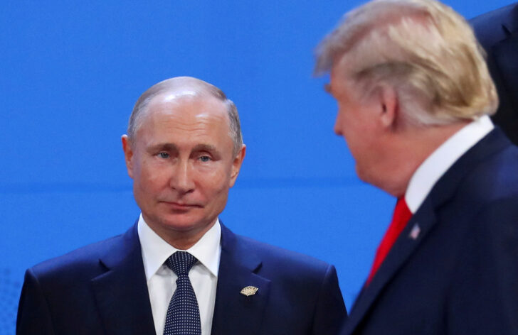 FILE PHOTO: Putin and Trump are pictured in 2018 in Argentina
