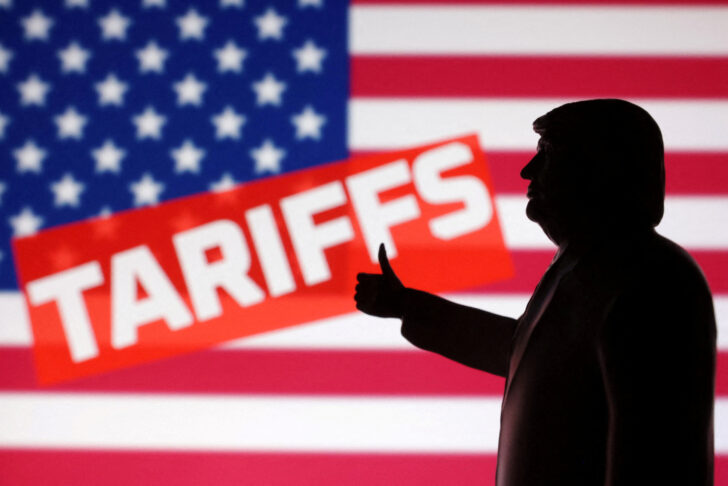 FILE PHOTO: Illustration shows 3D-printed miniature model depicting U.S. President Donald Trump, U.S. flag and word