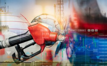 Car fueling at gas station. Refuel fill up with petrol gasoline. Blur industrial gas storage tank and petroleum refinery plant. Petrol industry. Petrol price and oil crisis concept. Stock market graph